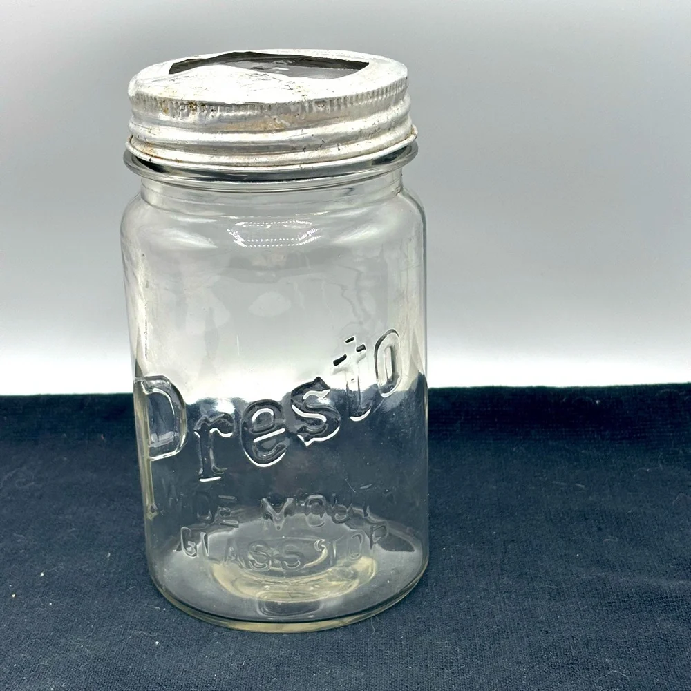 VTG. Rare Presto wide mouth cylindrical shape qt. Jar with glass bow tie lid.